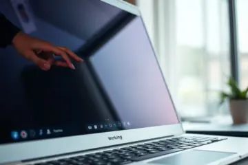 alt_text: A MacBook Pro on a modern desk, its screen displaying a high-quality IPTV streaming interface with a buffering icon and network diagnostics.