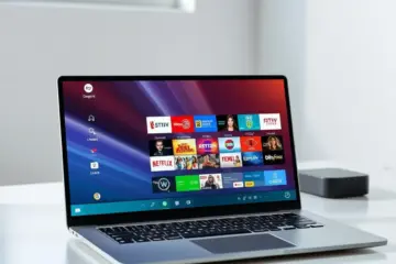 alt_text: A sleek Windows 11 laptop displays a vibrant IPTV channel grid on a clean, modern desktop.